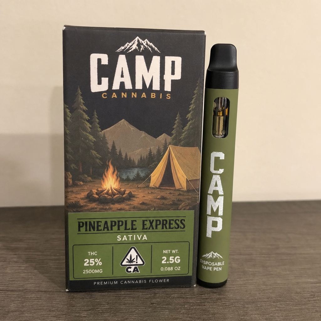 Olive green CAMP Cannabis Pineapple Express Sativa 2.5g disposable vape pen next to its campfire-themed packaging box - CAMP disposable vape review by VapeFeat