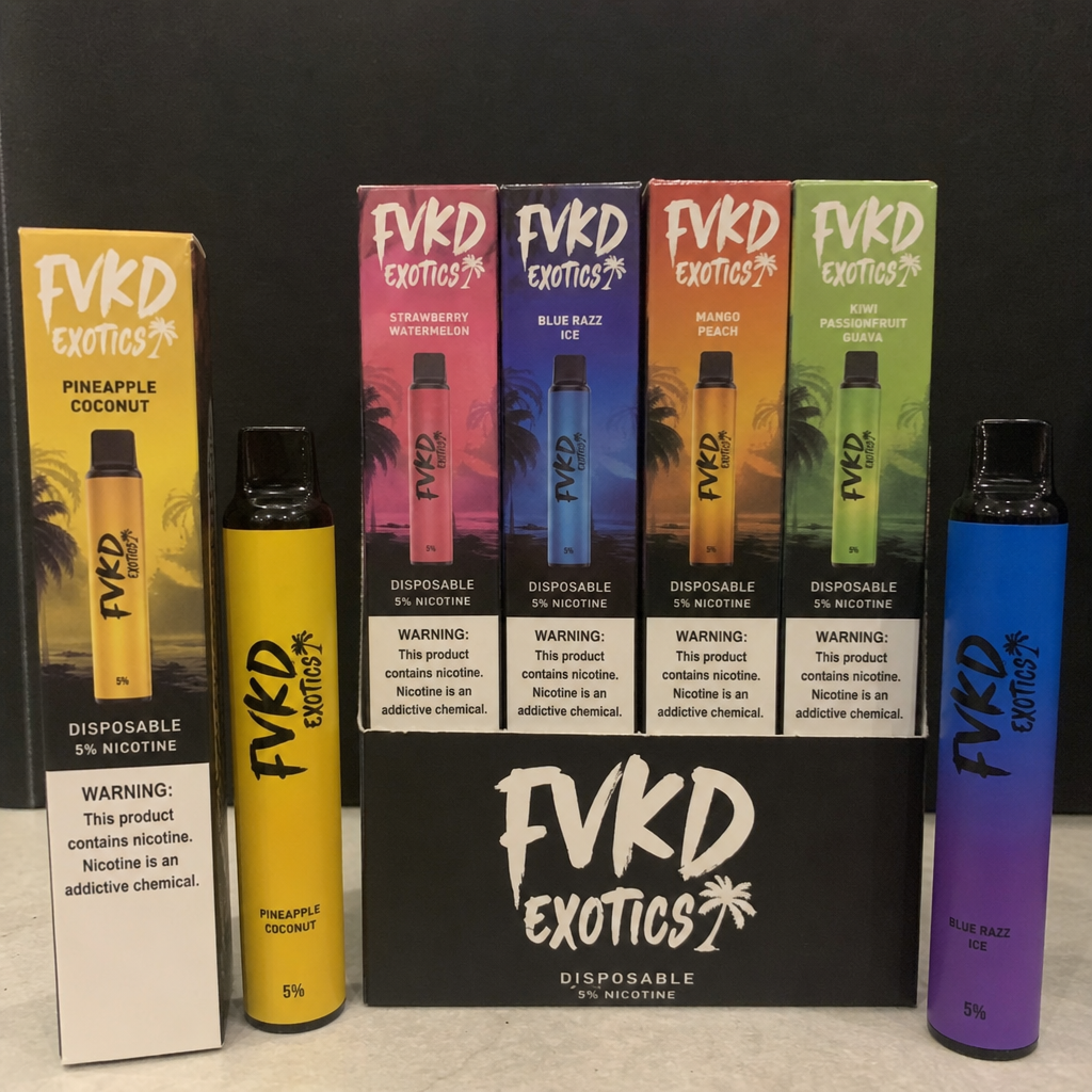 FVKD Exotics 5 percent nicotine disposable vape pens display box showing Pineapple Coconut and Blue Razz Ice devices with flavor cartons - FVKD Vape review by VapeFeat