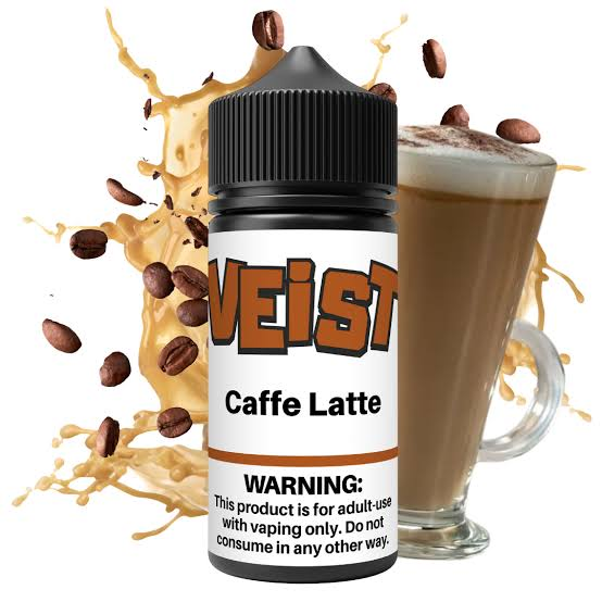 VEIST Caffe Latte e-liquid bottle next to a tall glass mug of latte coffee with milk foam, coffee beans splash, and warning label on a white background - VEIST vape juice review on VapeFeat